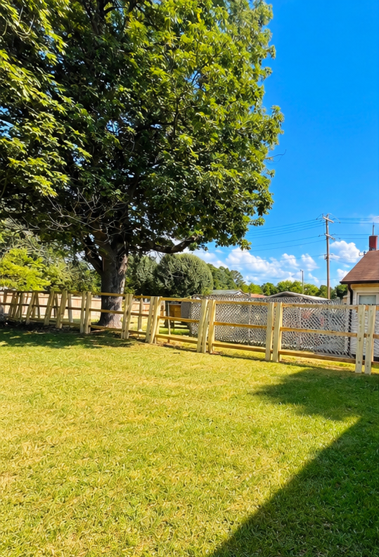 Pressure-Treated Wood Post-and-Rail Fence.