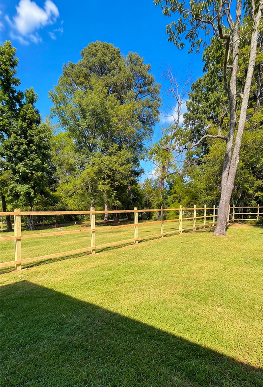 Pressure-Treated Wood Post-and-Rail Fence.